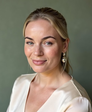 Professional headshot style example with a Sage green background
