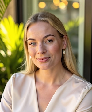 Professional headshot style example with a Tropical light background