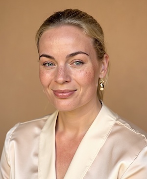 Professional headshot style example with a Warm beige background